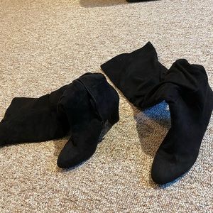Black knee high boots. Only worn 3x, size 9.5